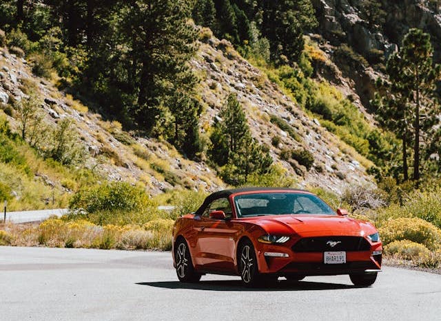 A red car on the road.